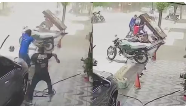 Rajada de vento derrubar placa sobre motociclista em Quixeramobim no Ceará